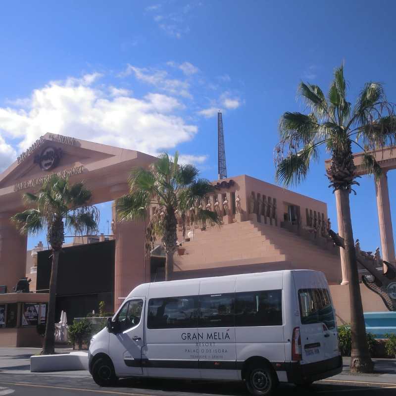 a truck is parked in front of a building